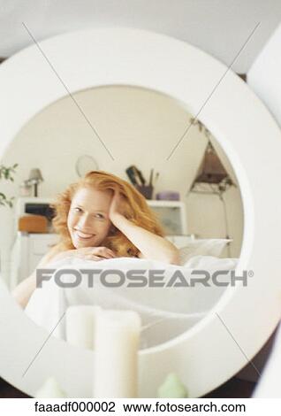 Stock Image - reflection, reflections, woman, females, mirror, mirrors, beautiful. Fotosearch