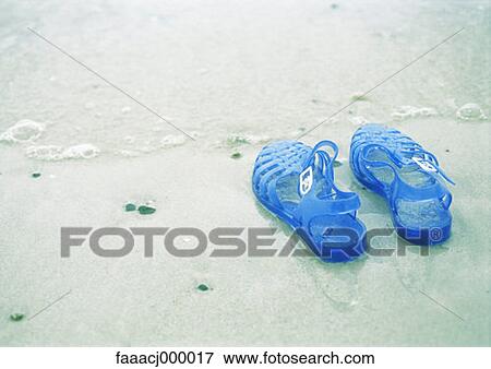 sandal, sandals, sea, beach, sand, surf, water's edge View Large Photo Image Stock Photo - sandal, sandals, sea, beach, sand, surf, water's edge. Fotosearch
