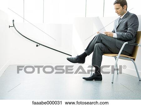 sitting, male, males, chair, chairs, executive View Large Photo Image Stock Image - sitting, male, males, chair, chairs, executive. Fotosearch
