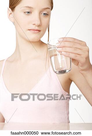 woman, females, drink, beverage, water, glass of water, glass of water View Large Photo Image Stock Image - woman, females, drink, beverage, water, glass of water, glass of water. Fotosearch