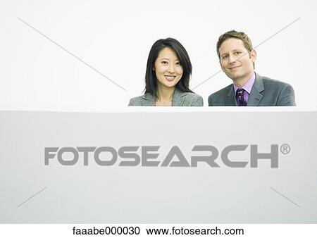 Stock Image - woman, females, male, males, colleague, colleagues. Fotosearch