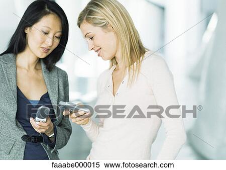 Stock Photography - woman, females, phone, phones, telephone, telephones, cell phone. Fotosearch