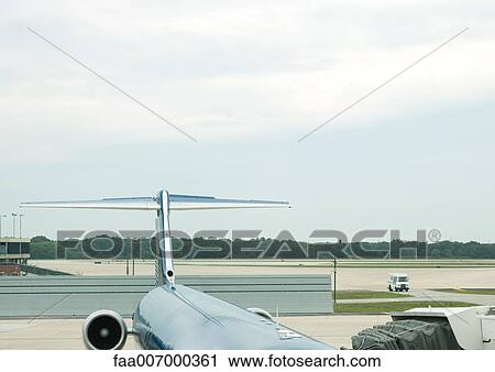 Airplane at boarding gate View Large Photo Image Stock Image - Airplane at boarding gate. Fotosearch