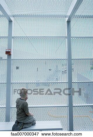 Boy in cage View Large Photo Image Stock Photo - Boy in cage. Fotosearch