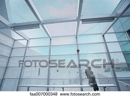 Boy in cage View Large Photo Image Stock Photo - Boy in cage. Fotosearch
