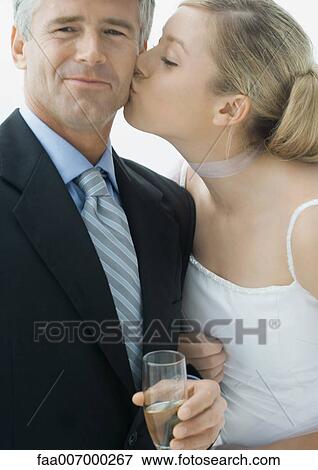 Bride kissing father View Large Photo Image Stock Photo - Bride kissing father. Fotosearch