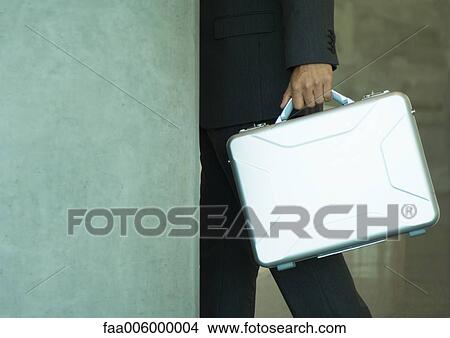 Picture - Briefcase being carried. Fotosearch