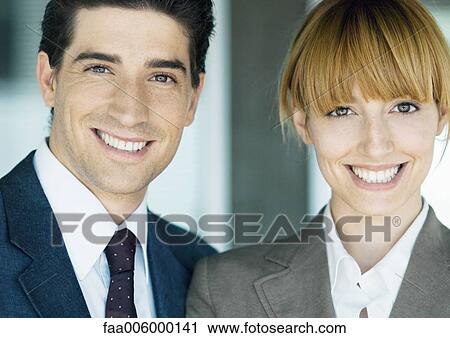 Business partners smiling at camera, portrait View Large Photo Image Stock Image - Business partners smiling at camera, portrait. Fotosearch