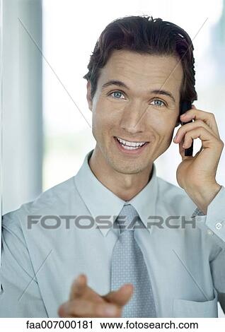 Businessman phoning and smiling View Large Photo Image Stock Image - Businessman phoning and smiling. Fotosearch