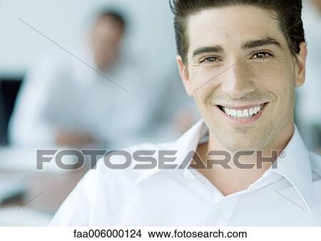 Businessman smiling View Large Photo Image Picture - Businessman smiling. Fotosearch