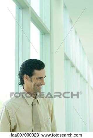 Businessman smiling View Large Photo Image Stock Image - Businessman smiling. Fotosearch