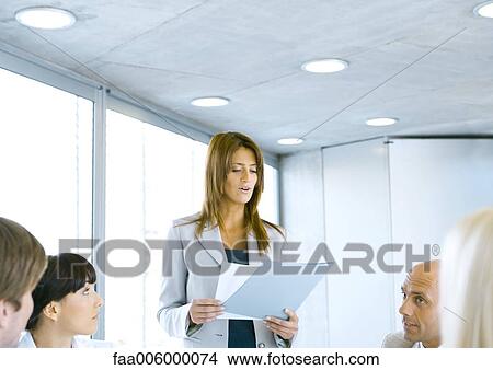 Businesswoman giving presentation View Large Photo Image Picture - Businesswoman giving presentation. Fotosearch