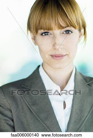 Businesswoman looking at camera, portrait View Large Photo Image Stock Image - Businesswoman looking at camera, portrait. Fotosearch
