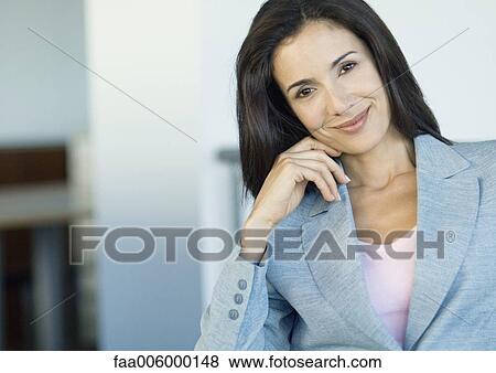 Businesswoman smiling at camera, portrait View Large Photo Image Stock Photo - Businesswoman smiling at camera, portrait. Fotosearch