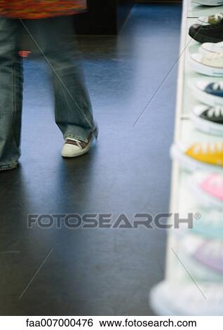 Canvas shoes lined up in store View Large Photo Image Stock Photograph - Canvas shoes lined up in store. Fotosearch