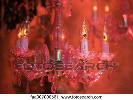 Chandelier, red-toned View Large Photo Image Stock Image - Chandelier, red-toned. Fotosearch