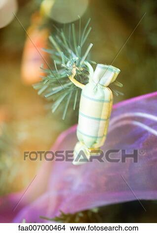 Christmas decoration on tree, close-up View Large Photo Image Picture - Christmas decoration on tree, close-up. Fotosearch