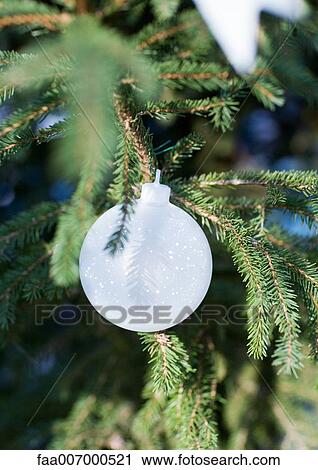 Christmas decoration on tree, close-up View Large Photo Image Stock Image - Christmas decoration on tree, close-up. Fotosearch