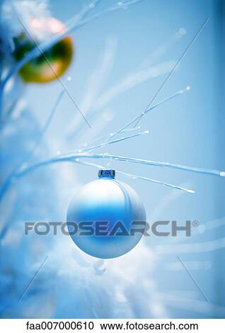 Stock Image - Christmas decoration on tree, close-up. Fotosearch