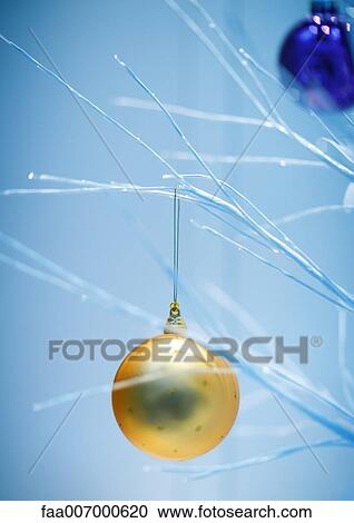 Stock Image - Christmas decoration on tree, close-up. Fotosearch