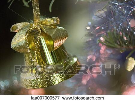 Stock Photo - Christmas decoration on tree, close-up. Fotosearch
