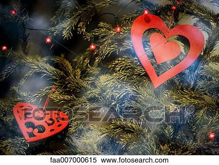 Christmas decoration on tree, close-up View Large Photo Image Stock Photography - Christmas decoration on tree, close-up. Fotosearch