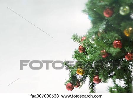 Christmas decorations on tree, close-up View Large Photo Image Stock Image - Christmas decorations on tree, close-up. Fotosearch