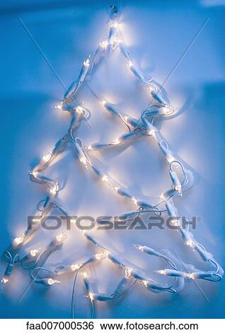 Christmas tree shape made out of christmas lights View Large Photo Image Stock Photograph - Christmas tree shape made out of christmas lights. Fotosearch