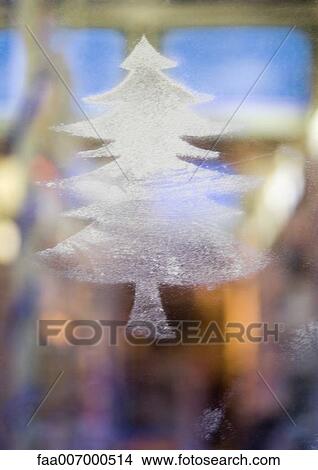 Christmas tree shape on window pane View Large Photo Image Picture - Christmas tree shape on window pane. Fotosearch