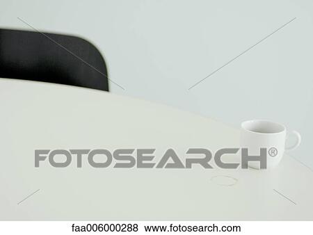 Coffee cup and coffee ring on table View Large Photo Image Stock Photo - Coffee cup and coffee ring on table. Fotosearch