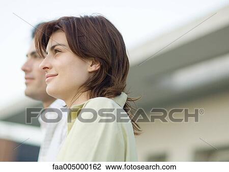 Couple, side view, portrait View Large Photo Image Stock Image - Couple, side view, portrait. Fotosearch