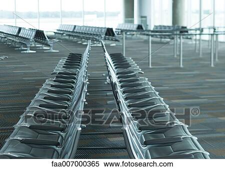 Empty seats in airport lounge View Large Photo Image Stock Photography - Empty seats in airport lounge. Fotosearch