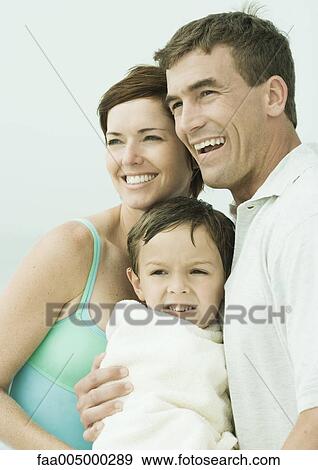 Family portrait in beachwear View Large Photo Image Stock Photo - Family portrait in beachwear. Fotosearch