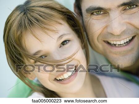 Stock Image - Father and daughter, portrait. Fotosearch