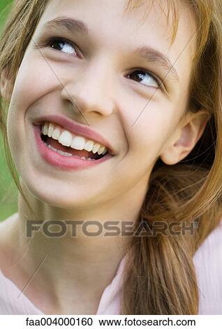 Stock Image - Girl smiling, close-up. Fotosearch