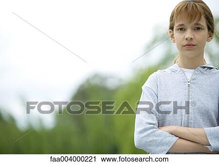 Girl with arms crossed View Large Photo Image Stock Image - Girl with arms crossed. Fotosearch
