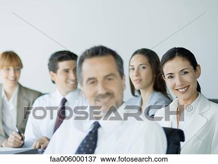 Group of business colleagues smiling View Large Photo Image Stock Photo - Group of business colleagues smiling. Fotosearch