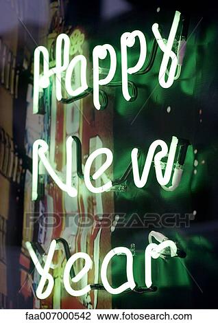 Happy New Year written in neon lights View Large Photo Image Stock Image - Happy New Year written in neon lights. Fotosearch