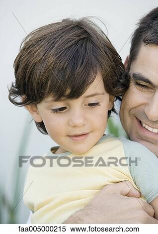 Man holding son, portrait View Large Photo Image Stock Photography - Man holding son, portrait. Fotosearch