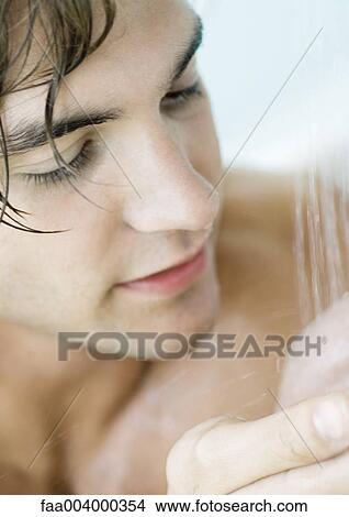Man in shower, close-up View Large Photo Image Picture - Man in shower, close-up. Fotosearch