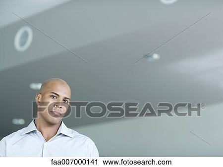 Man looking at camera, portrait View Large Photo Image Stock Image - Man looking at camera, portrait. Fotosearch