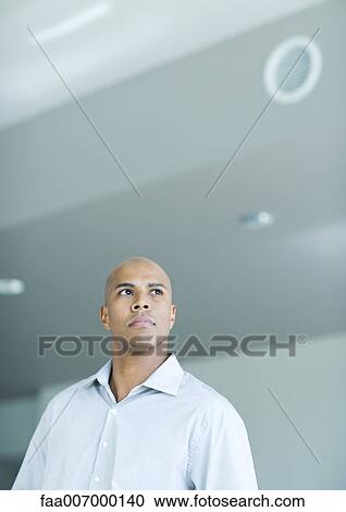 Man looking away, portrait View Large Photo Image Stock Image - Man looking away, portrait. Fotosearch