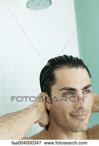 Man taking shower View Large Photo Image Stock Photo - Man taking shower. Fotosearch