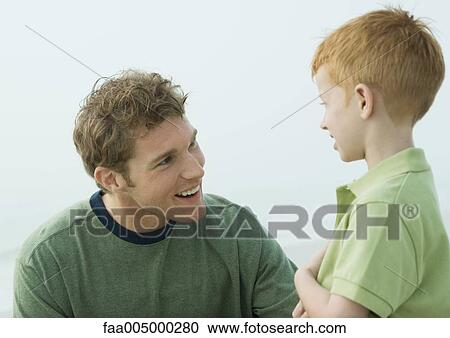 Man talking to son View Large Photo Image Stock Image - Man talking to son. Fotosearch
