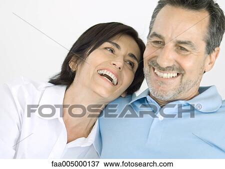 Mature couple laughing View Large Photo Image Stock Photo - Mature couple laughing. Fotosearch