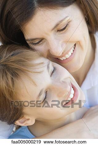 Mother and daughter, close-up View Large Photo Image Stock Photo - Mother and daughter, close-up. Fotosearch
