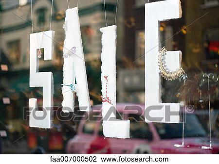 Sale sign in shop window View Large Photo Image Stock Image - Sale sign in shop window. Fotosearch