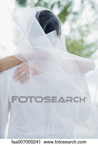 Stock Image - Scene from beach wedding. Fotosearch