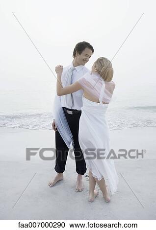 Stock Image - Scene from beach wedding. Fotosearch