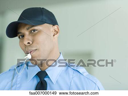 Stock Photo - Security guard blowing whistle. Fotosearch